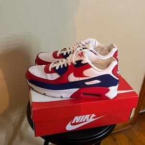 Kids Nikes. Barely worn. Red, white and blue size 7y.